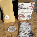 Coley Bros mushroom growing kit with packaging and instructions on a wooden surface.