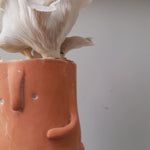 Mushrooms growing in a vase